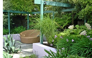 Perennials and ornamental grasses are used to give seasonal interest within the garden plan. 